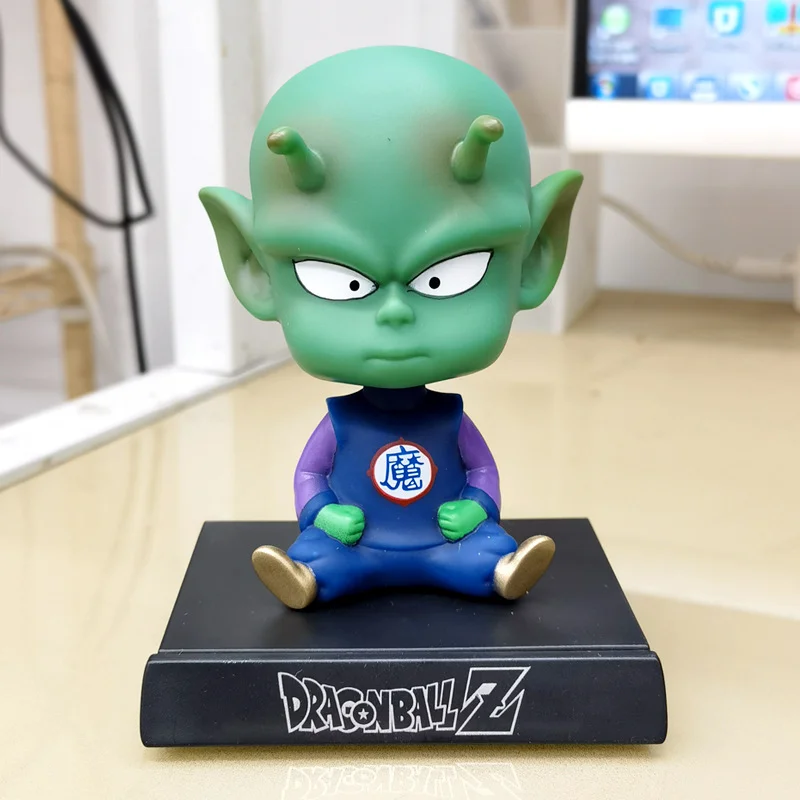 Dragon ball z bonecas suporte de telefone anime figura son goku kuririn balançando a cabeça bonecas ornamentos carro acessórios crianças brinquedos