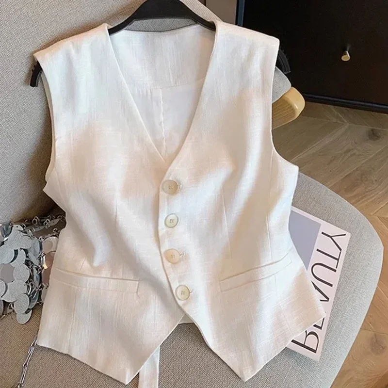 

French white linen V-neck vest female summer new fashion high-end sleeveless suit chic waist slimming temperament top.