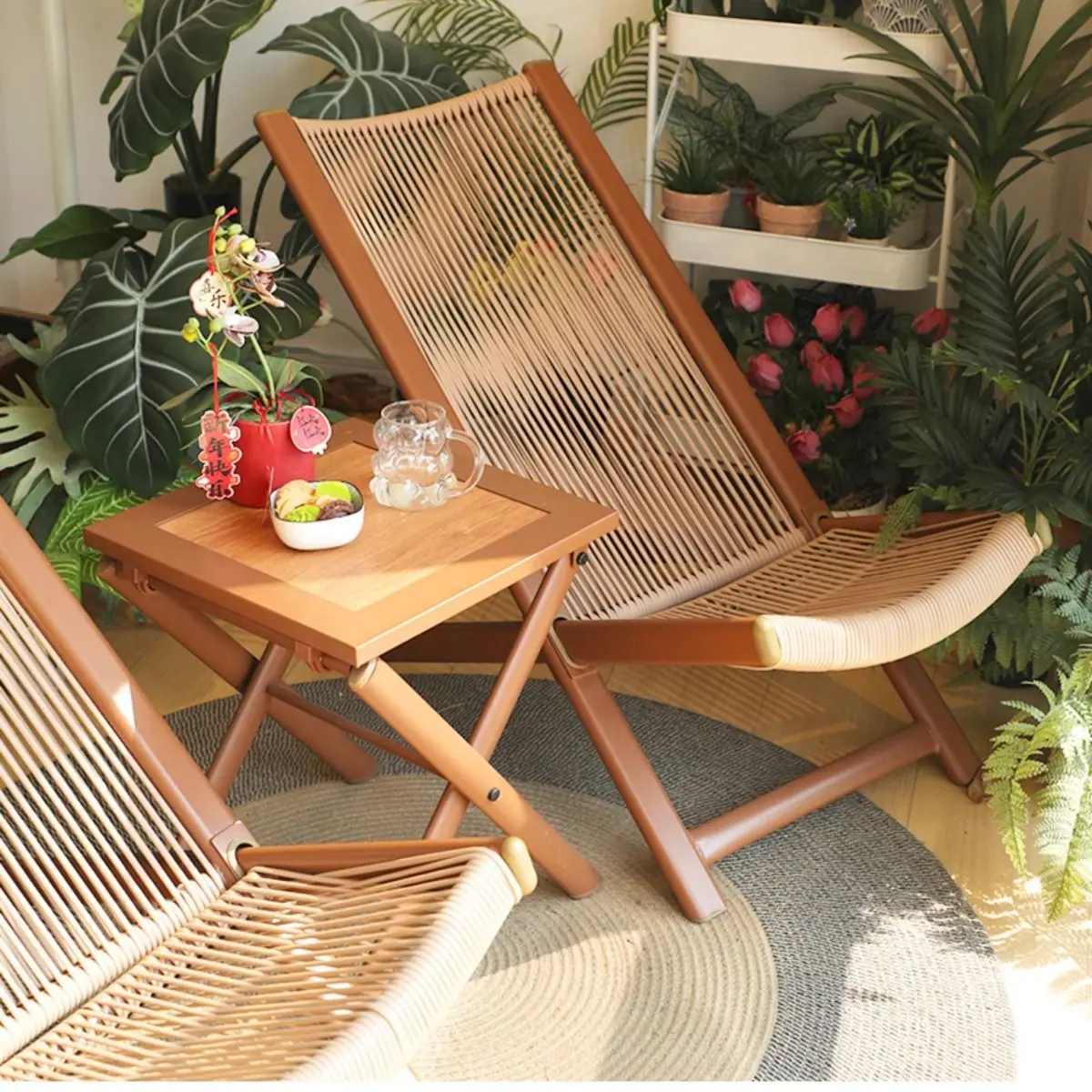 Antique wood-frame folding rattan lounge chair on a small balcony