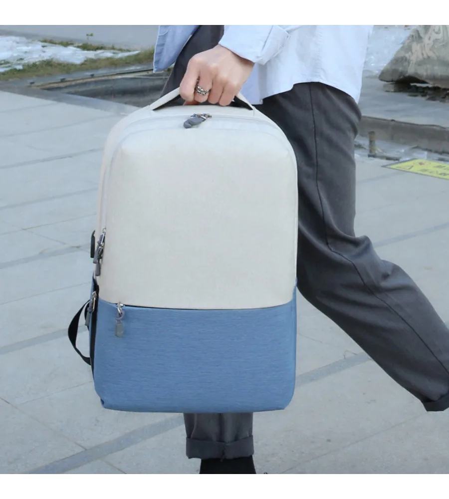 

Two tone gray white laptop backpack anti splash soft fabric large space for office commute short travel daily item storage