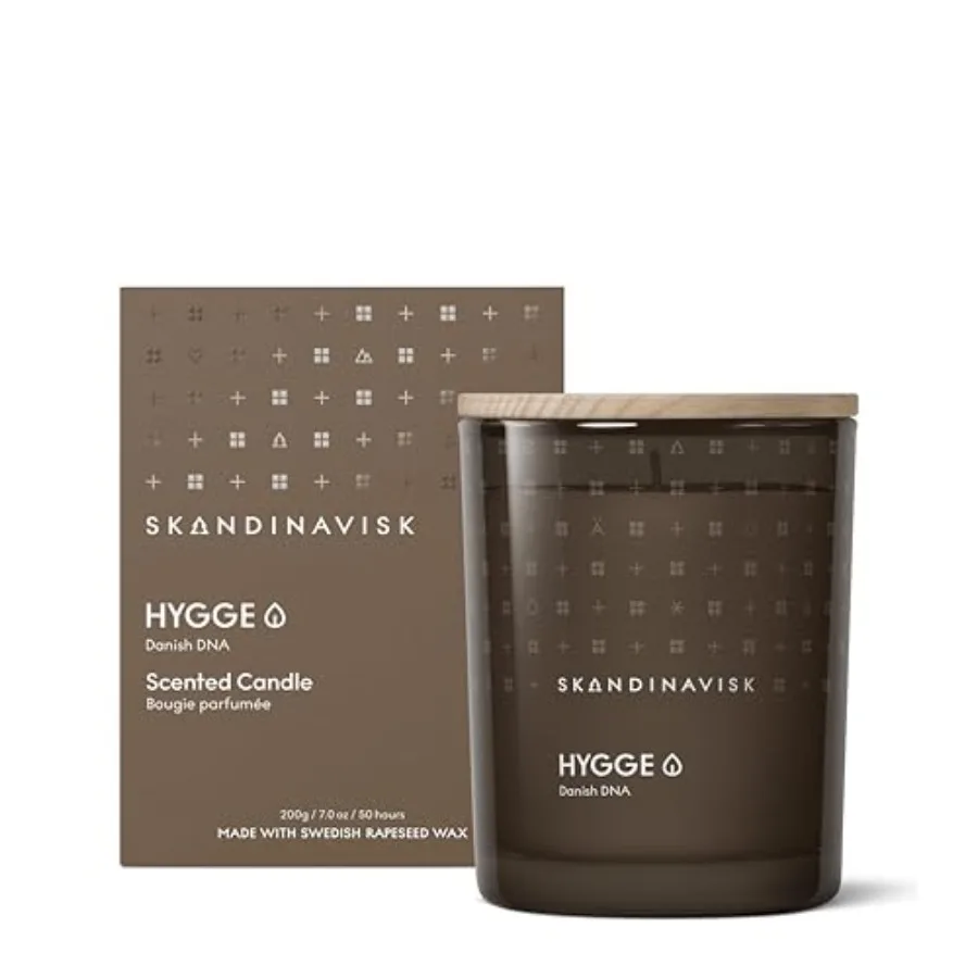 

Hygge 'Cosiness' Scented Candle. Fragrance Notes: Black Tea and Mint Leaves Dried Apples and Baked Cinnamon