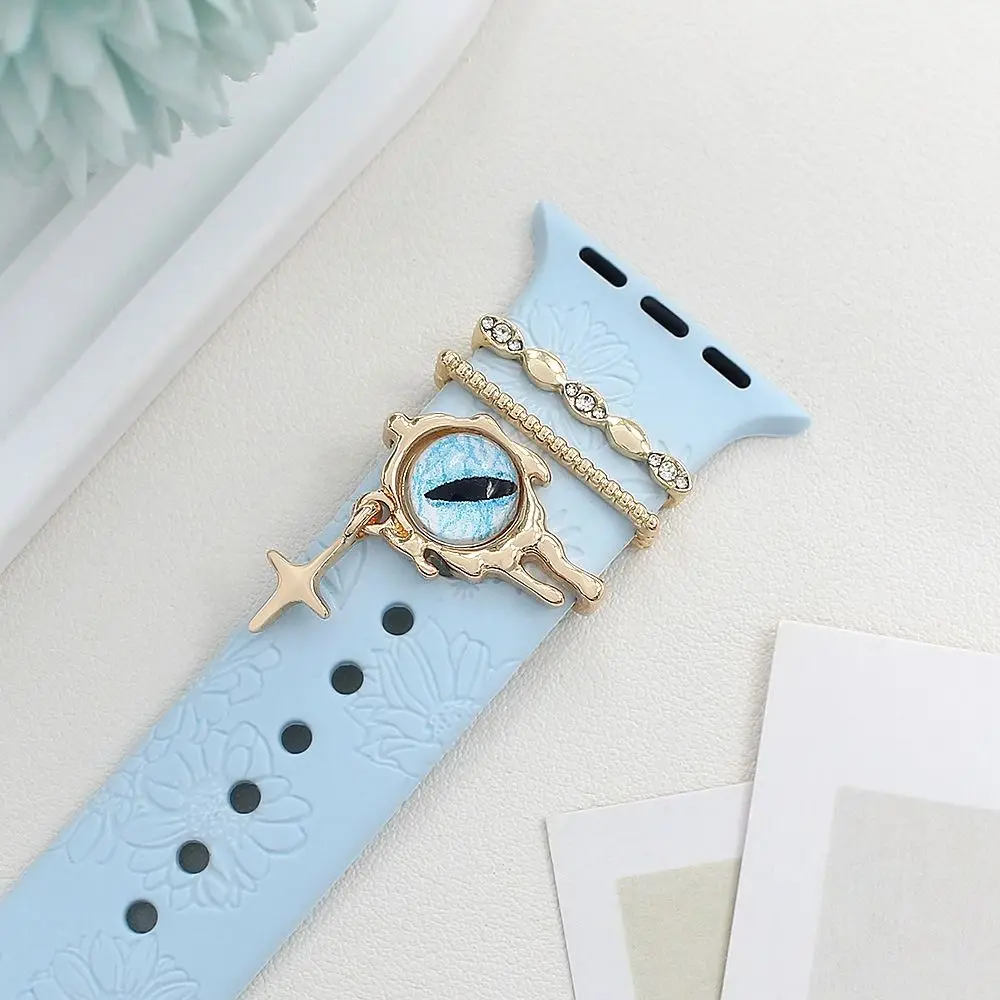 สายรัดโลหะตกแต่งแหวนเครื่องประดับเพชรสร้อยข้อมือตกแต่งตาสีฟ้า Charms เครื่องประดับสําหรับ Apple Watch Band