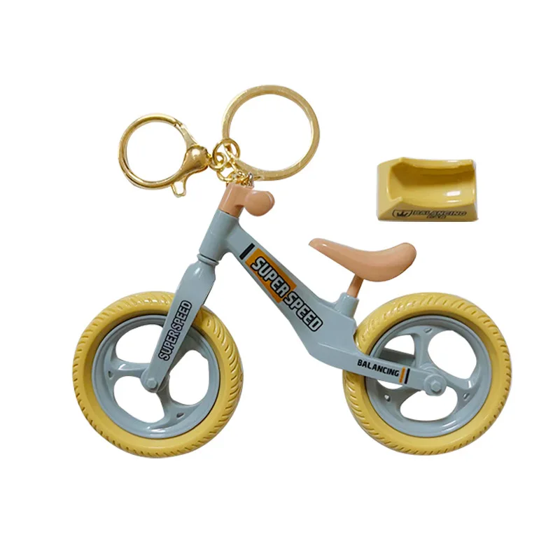 Giocattoli divertenti creativi Glide bicicletta zaino ciondolo coppia gioielli portachiavi ciondolo piccoli regali giocattoli per bambini giocattolo antistress