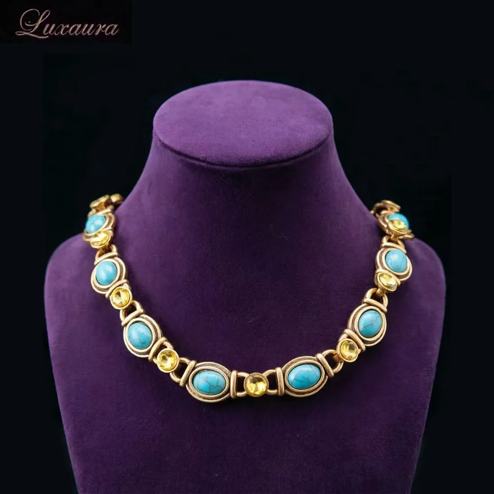 

Vintage jewelry featuring a fashionable and classic blue geometric necklace design paired with Bohemian style women's necklace