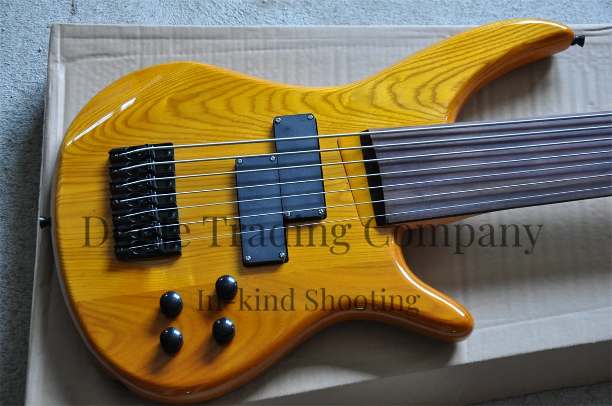 Fretless Electric Bass 7 string bass Ash wood body Rose wood fingerboard 24 Frets Black single bridge Maple neck support custom