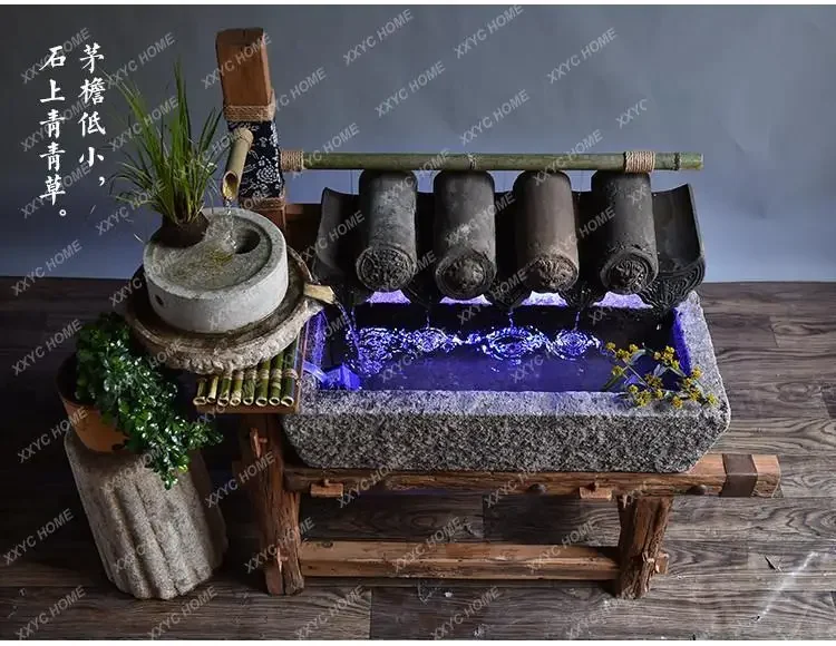 A Jiangnan stone tools, running water wooden frame, stone trough ornament combination, fish tank balcony water feature