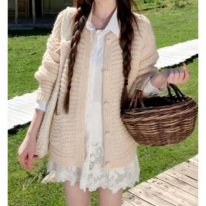 Korean Simple White Hollow Long-sleeved Knitted Cardigan Women's 2026 Spring and Autumn New Design Versatile Sweater Top