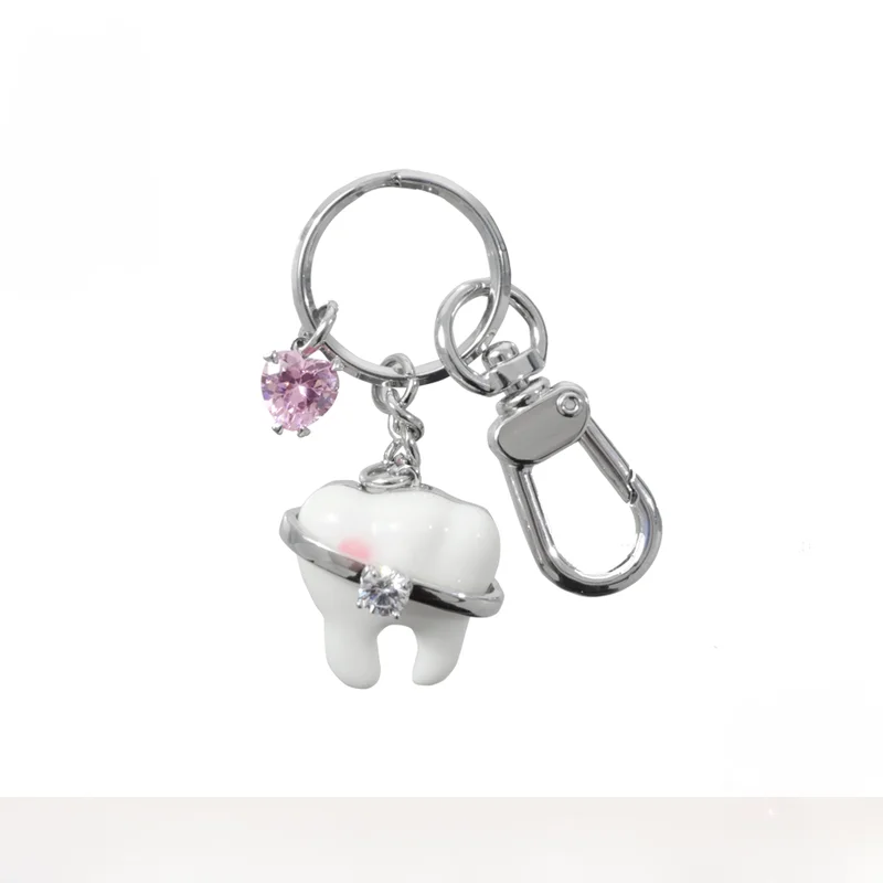 

Challenge to become the cutest tooth keychain and lanyard on the whole network