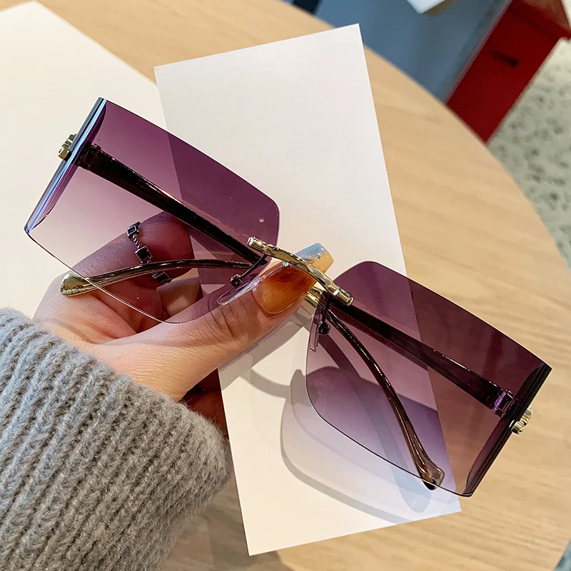 Women's Sunglasses Frameless Edge Cut Sunglasses Fashionable Leopard Head High-end Curved Car Sunglasses 90299