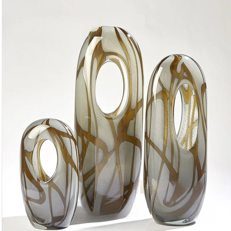 Light luxury minimalist modern glass vase floral set, a variety of innovative hollow ornaments, sales office decoration