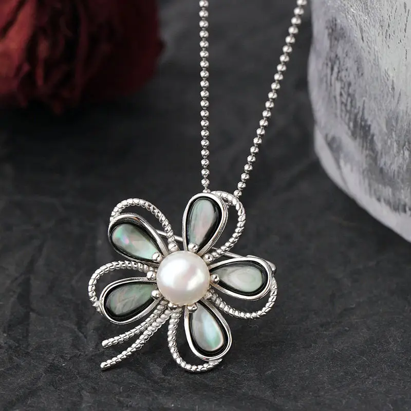 

Natural Pearl Shellfish Petals Design 925 Sterling Silver Pendant With its Dual Functionality as Both a Pendant and a Brooch