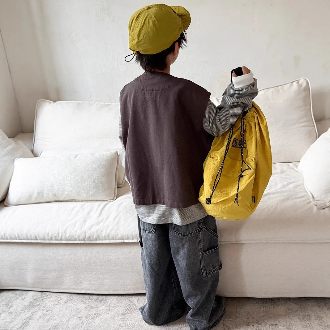 سترة جديدة للأولاد والبنات لربيع وخريف 2025 على الموضة الكورية ملابس خارجية غير رسمية يومية تناسب الجميع بلون سادة بدون أكمام #4