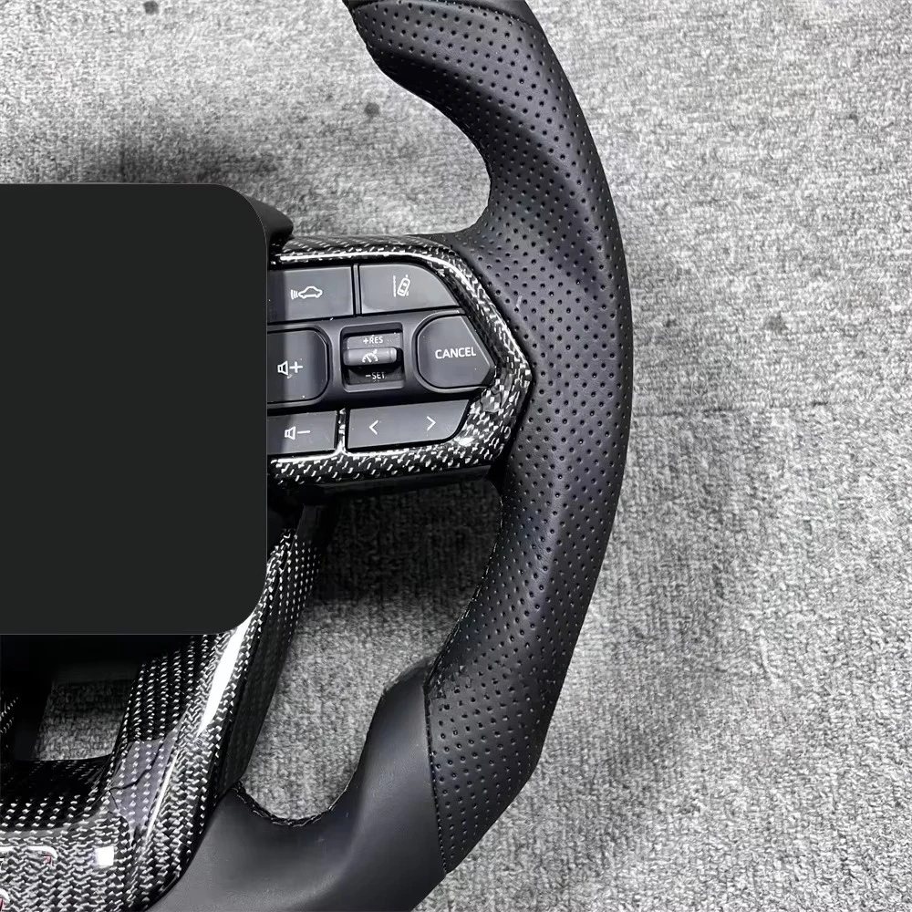 Venta caliente para Toyota LC300 de GR Logo cuero Real conjunto de volante de cuero perforado negro