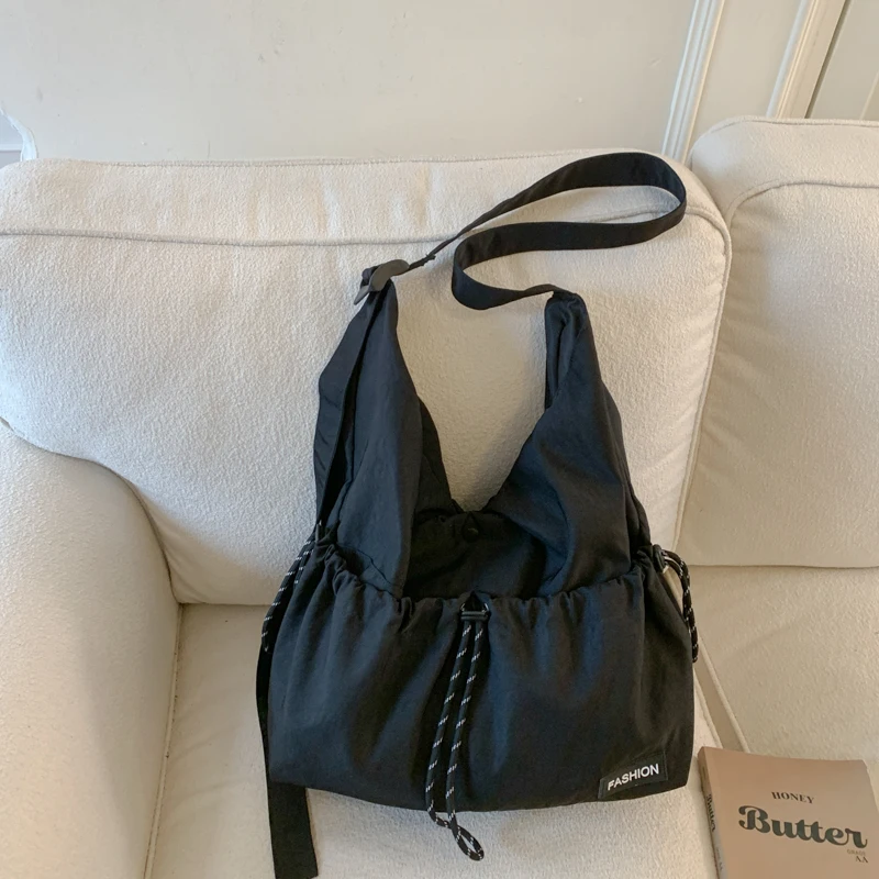 

Portable Adjustable Shoulder Strap Women's Crossbody Bags 2026 High Quality Casual New Solid Color Nylon Crossbody Bags