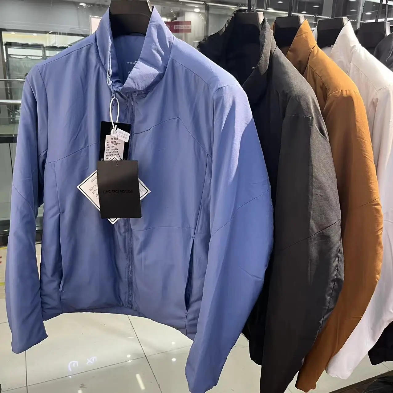 

Lightweight Warm Cotton Jaet for Men Outdoor Autumn Winter Stand Collar Faionable Youth Stand Fit Long Sve Pure Color