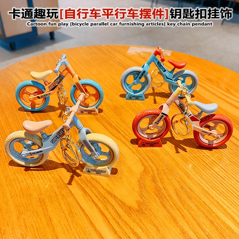 Creative Fun Toys Glide Bicycle Backpack Pendant Couple Jewelry Keychain Pendant Small Gifts Children's Toys Stress Relief Toy