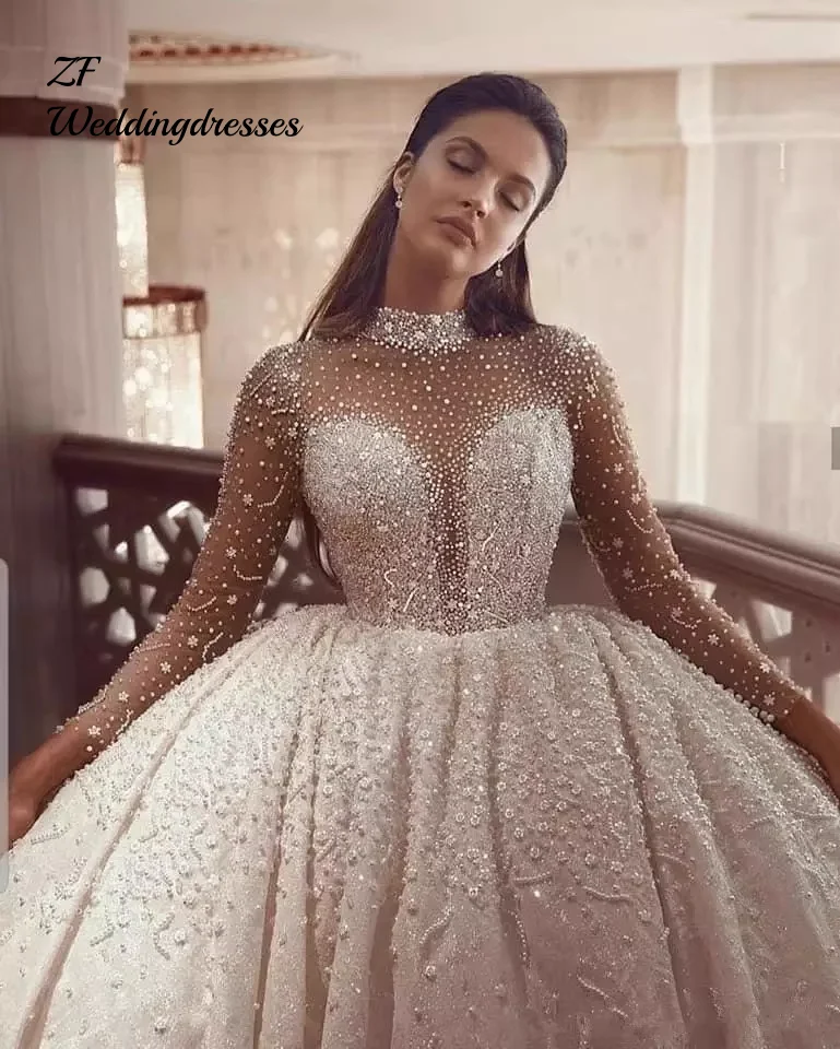 

Customized luxurious and shiny ball wedding dresses, long-sleeved high-neck princess dresses, beaded wedding dresses, and bridal