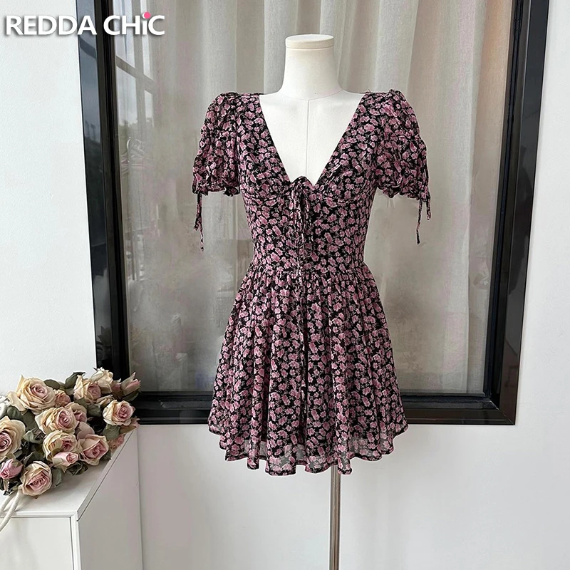 

ReddaChic Women Floral Deep V Neck Sundress Puff Short Sleeve Bandage A-line Pretty Elegant Mini Dress Holiday Summer Clothes