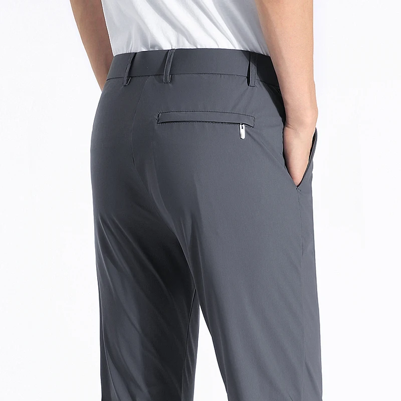 2024 minimalist new summer solid color Ice Silk fabric men's pocket zipper fashion versatile business casual straight Suit Pants