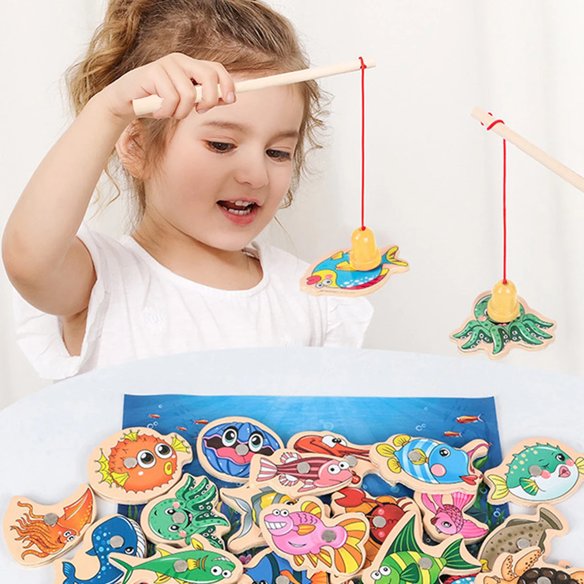 Giocattoli da pesca per bambini Set di giochi di pesca magnetici in legno Montessori canna da pesca per cartoni animati giocattoli educativi per