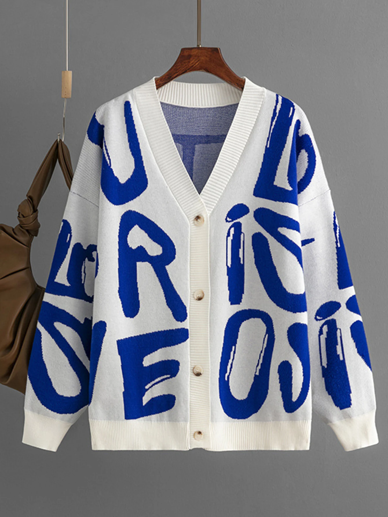 Damski sweter rozpinany z żakardowym wzorem liter, długi rękaw, zapinany na jeden guzik, odzież wierzchnia jesienno-zimowa, styl europejsko-amerykański.