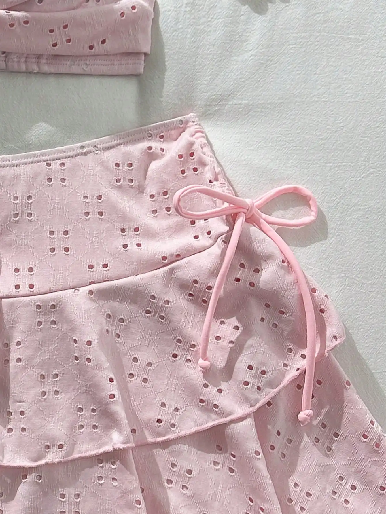 

Women's 3-Piece Pink Eyelet Swimsuit Set With Criss-Cross Top And Tiered Skirt