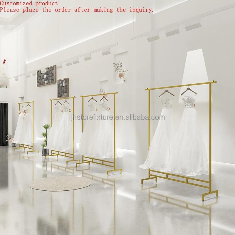 

Modern Style Clothes Display Rack Golden Stainless Steel Boutique Supplies Standing Clothes Hanger for Store Custom
