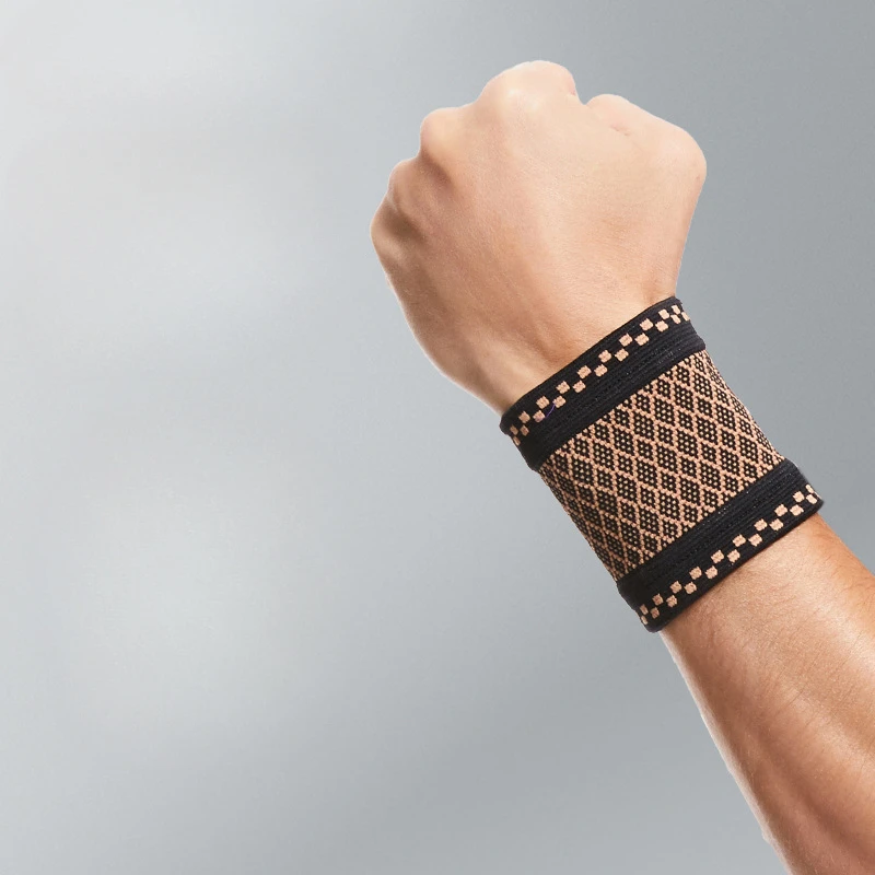 2pcs Copper wrist compression bracket, elastic sleeve for support - a soft bag for sports, fitness, and typing