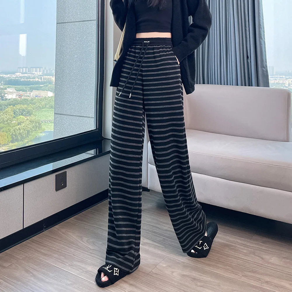 กางเกงขายาวผู้หญิงไซส์ใหญ่ ทรงหลวม สไตล์ลำลอง ลายทาง ขากว้าง ทรงตรง ใส่สบาย เหมาะกับฤดูใบไม้ผลิและฤดูใบไม้ร่วง ปี 2025