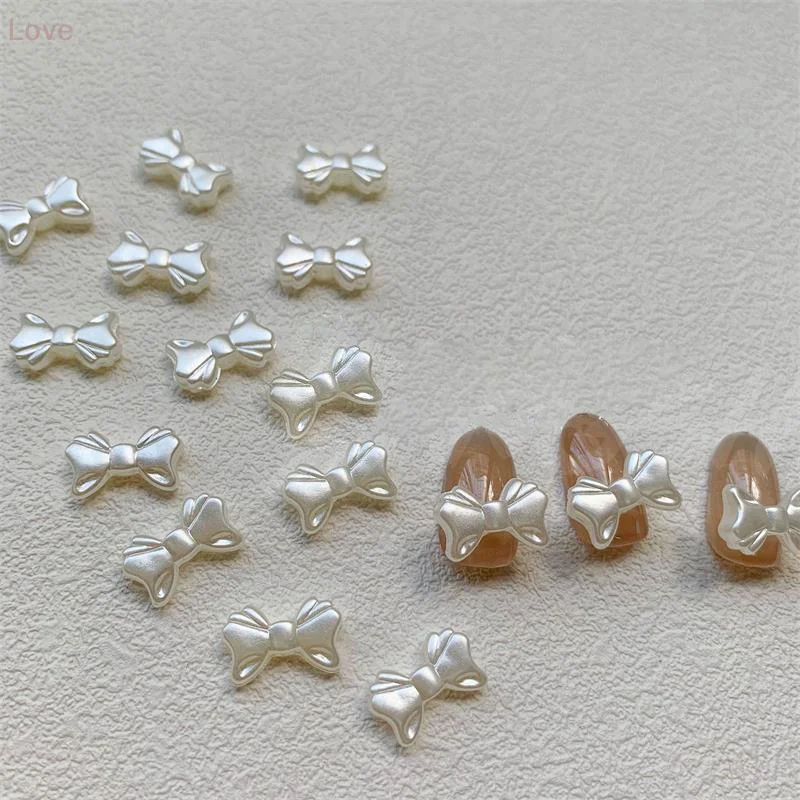 20 قطعة/الحقيبة اللؤلؤ الأبيض الرجعية الفرنسية بسيطة Bowknot مسمار الفن اكسسوارات أنيقة لطيف Bowknot ثلاثية الأبعاد الراتنج لتقوم بها بنفسك مسمار الفن اكسسوارات