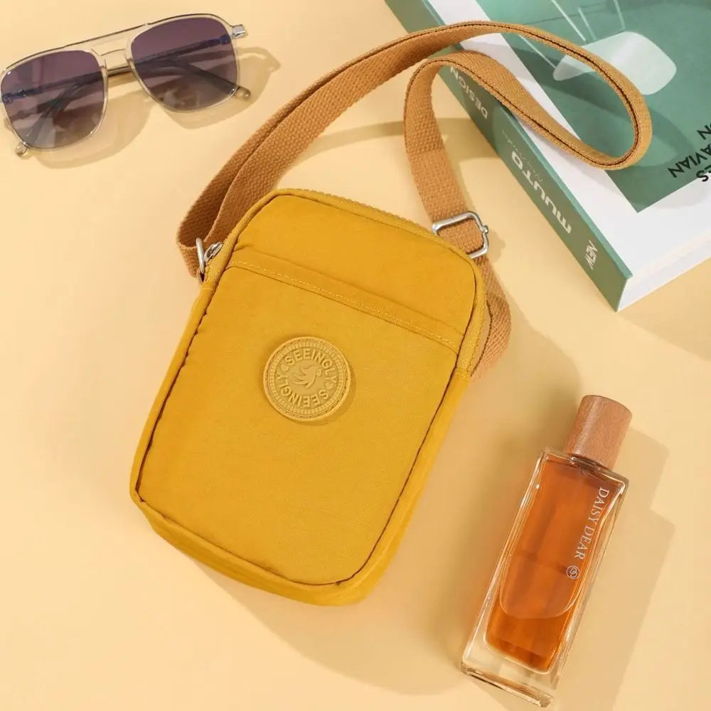 حقيبة كروس محمولة متعددة الوظائف بسحاب بتصميم متخصص حقيبة كتف من النايلون بلون سادة على الطراز الكوري حقيبة هاتف صغيرة للنساء #3