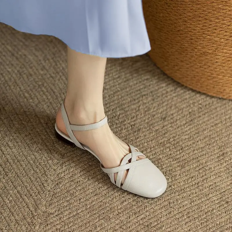 Baotou Women's Sandals  New Summer Retro Hollow Thick Heel Button Soft Leather Roman Sandals Flat Bottom