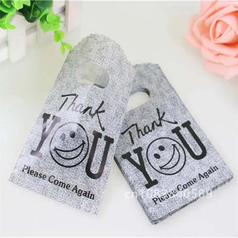 50pcs/lot 9*15cm Lovely Gray Mini Thank You Gift Bags Smile Face Small Plastic Shopping Bags for Small Business Hot Sale