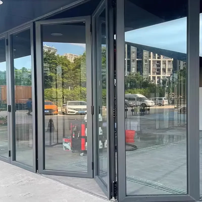 A New Design of Heavy-duty Folding Door System Suitable for Garages to Prevent Hurricanes and Save Space