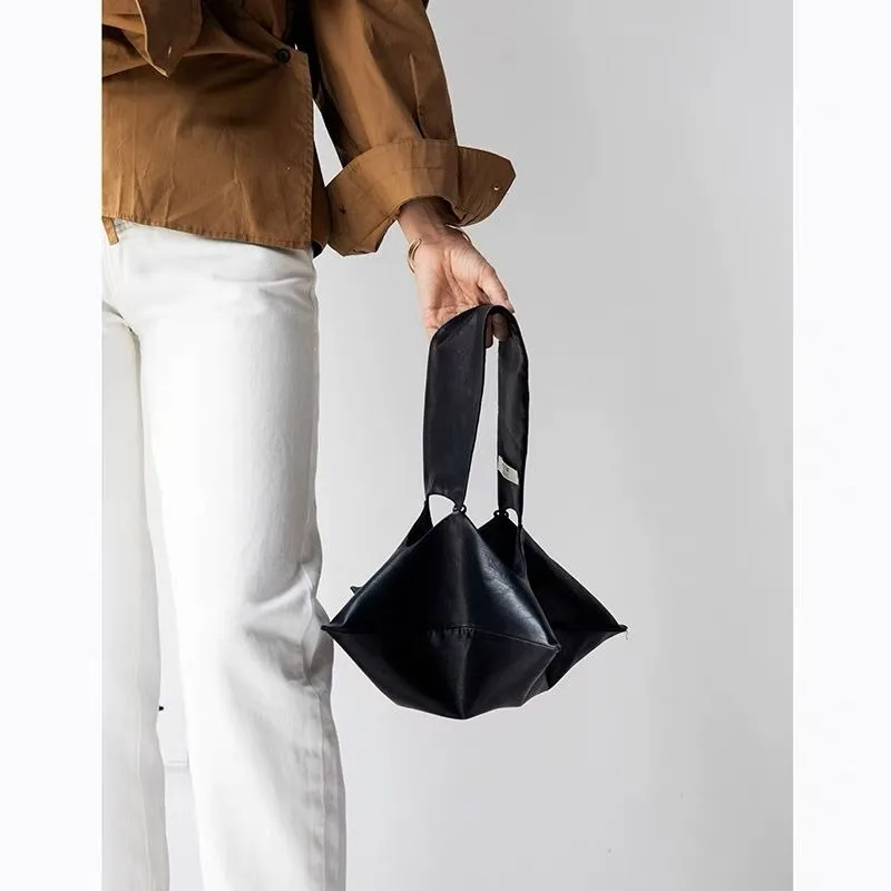 

Женская новая нишевая сумка через плечо нестандартного дизайна, портативная французская маленькая сумка, высококачественная кожаная сумка, простая индивидуальная, высокая цена