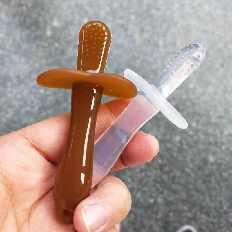 

2-in-1 Teether & Toothbrush, Silicone Gum Massager for Teething Babies, Safe Sterilizable Material, Unique design