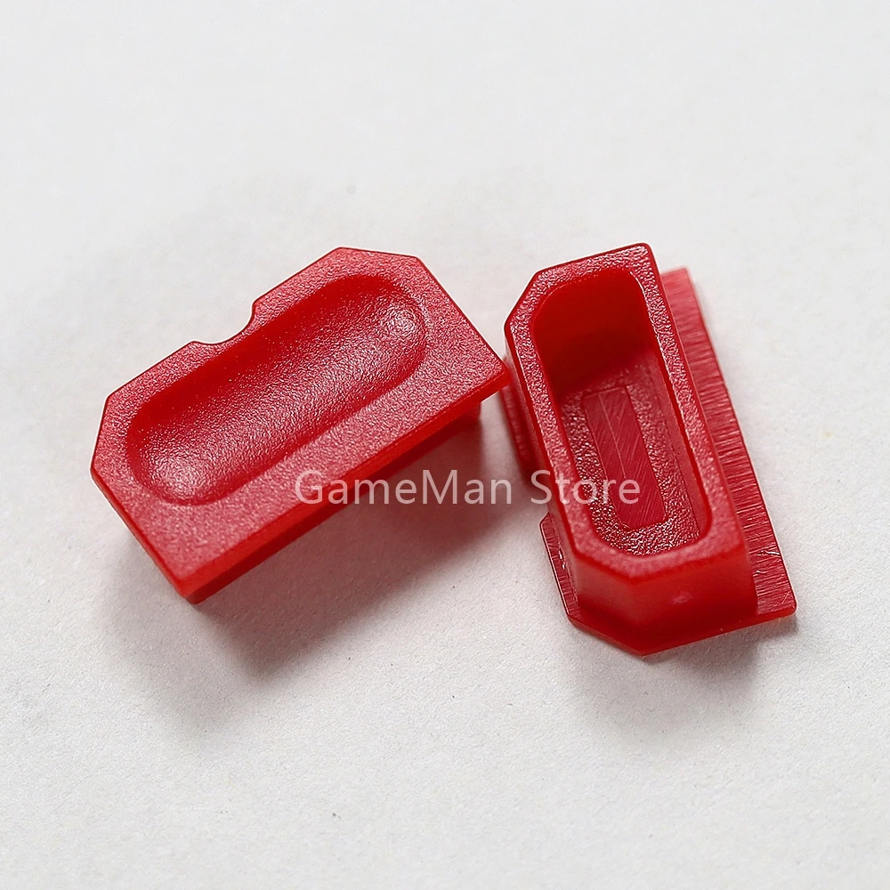 2 ชิ้นหลากสีฝุ่นสําหรับ Gameboy GB เกมคอนโซลเปลือกฝุ่นปลั๊กปุ่มพลาสติกสําหรับ GB DMG 001