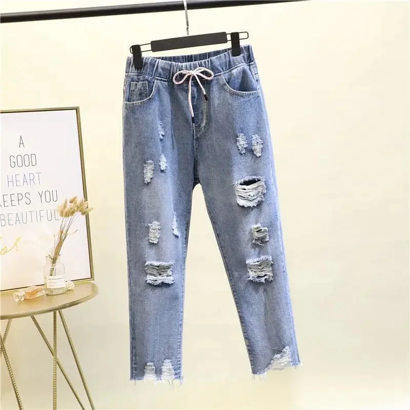 2026 New Korean version Ripped Jeans For women's Summer Loose Elastic waist Nine point Harem Pants Female Casual Denim Pants