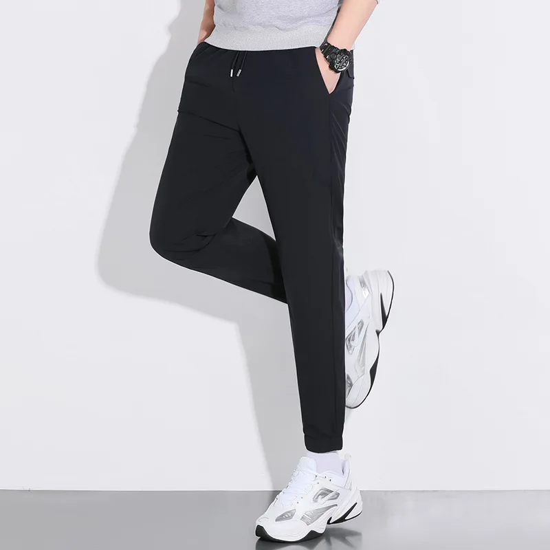 2023 Summer New Men's Clothing Solid Drawstring Straight Sleeve Sports Fashion Breathable Polyester Loose Long Pants JJ907