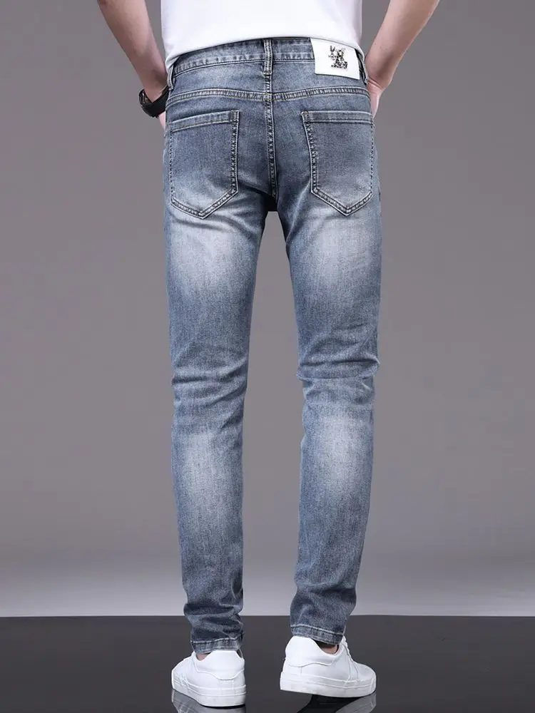 2024 primavera outono novo high-end bordado rasgado jeans moda masculina magro estiramento calças magras casuais cowboy denim