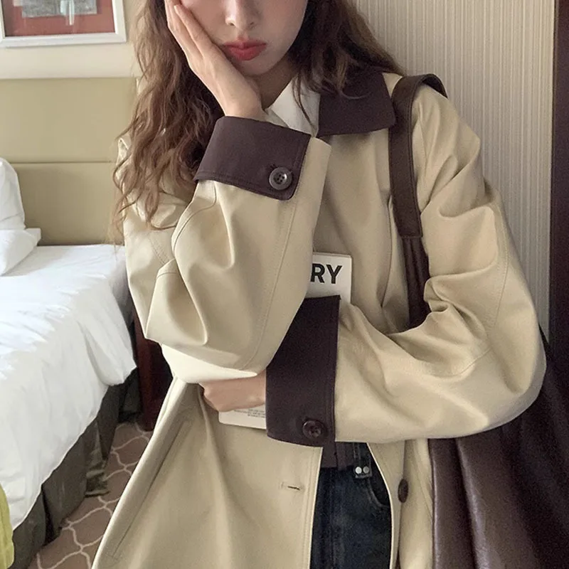 Trench coat di media lunghezza vintage stile college coreano per donna Capispalla beige allentato con risvolto monopetto chic alla moda