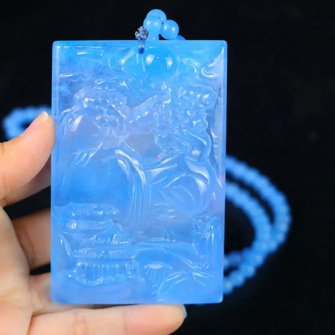

Идеальная ледяная голубая водная жадеит с резным пейзажем и нефритовой подвеской в подарочной упаковке
