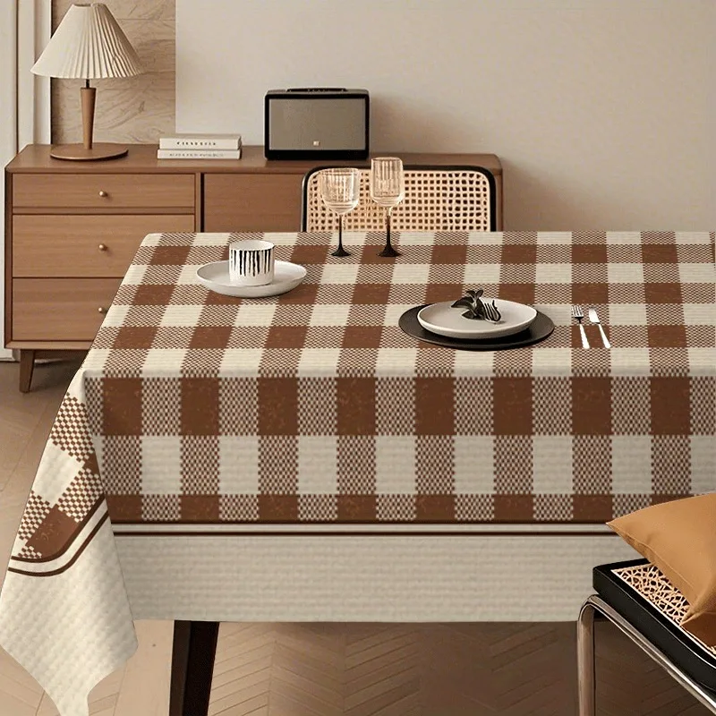 One vintage checked tablecloth, in classic brown and white colors.