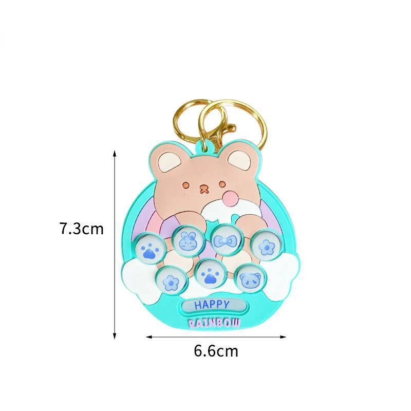 Mini máquina de juego portátil para niños, juguete electrónico de descompresión luminiscente, llavero pequeño con patrón de dibujos animados de