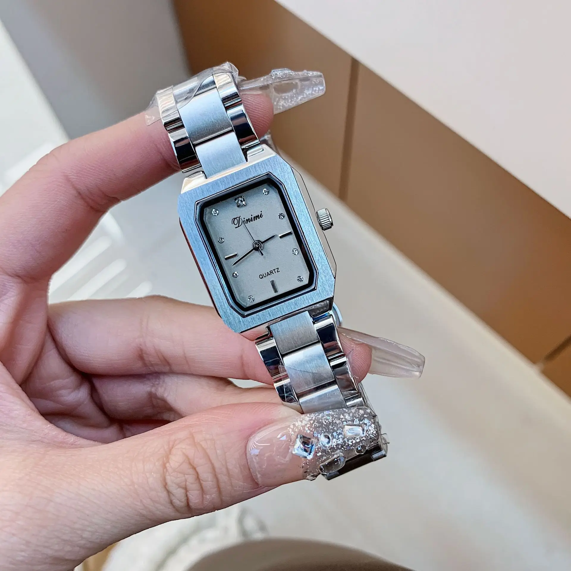 Elegant and sophisticated rectangular steel quartz watch for women, a stylish and casual design, perfect as a gift.
