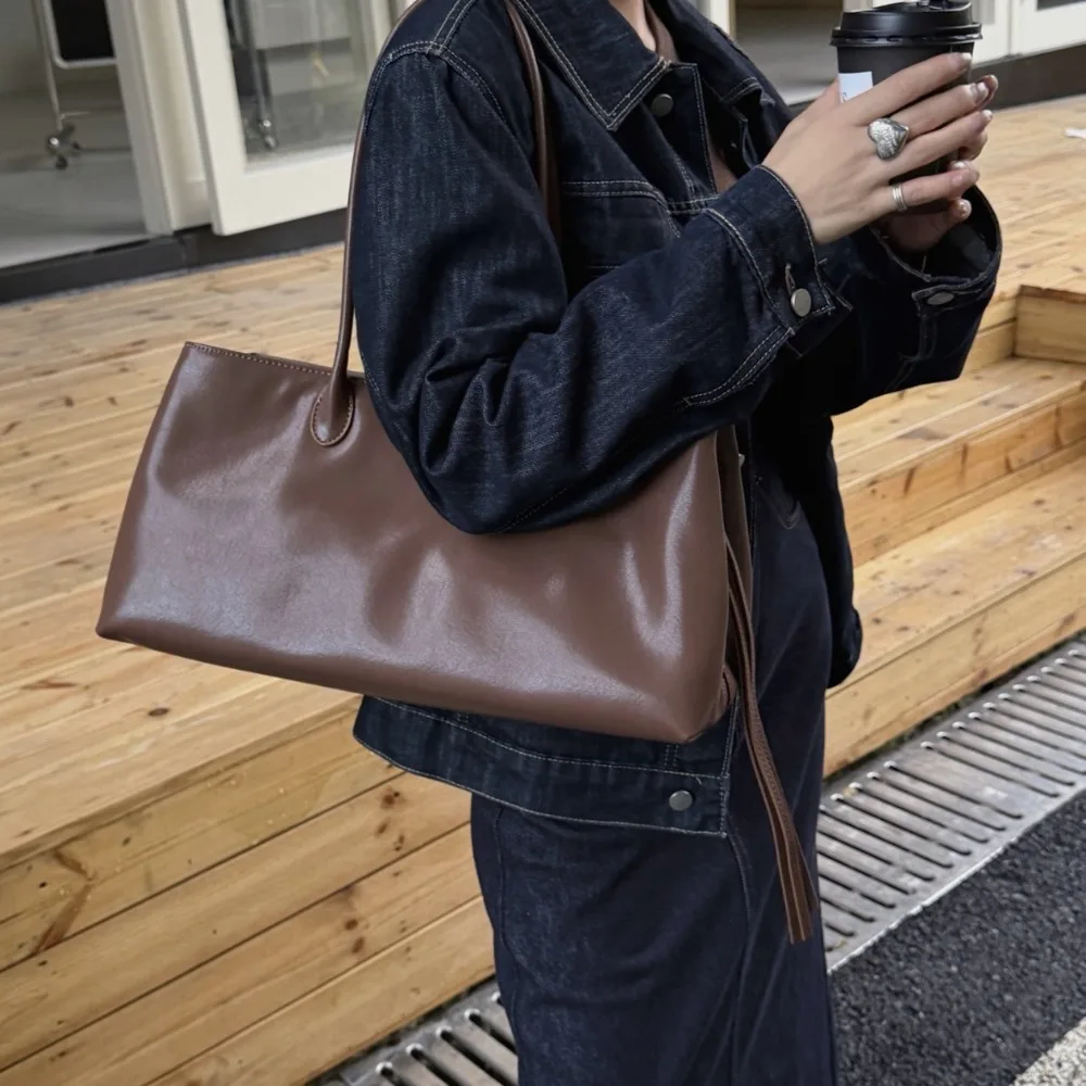 2026 New Leather First Layer Cowhide Fashionable Versatile Simple Tote Commuter Design Portable Shoulder Messenger Bag Unique