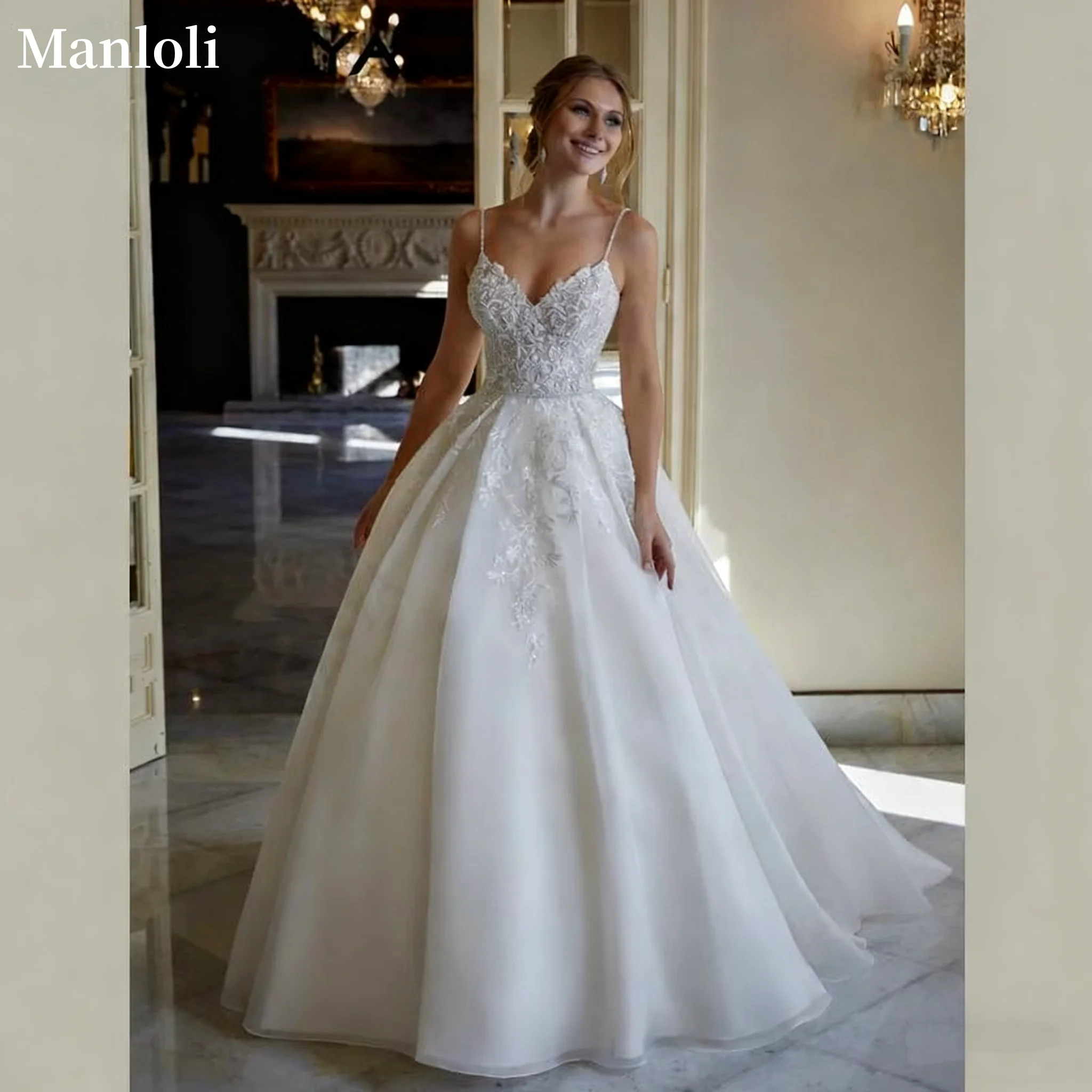 매력적인 스파게티 스트랩 여성 웨딩 드레스 섹시한 브이넥 백리스 웨딩 드레스 A라인 레이스 데칼 웨딩 드레스 맞춤 제작