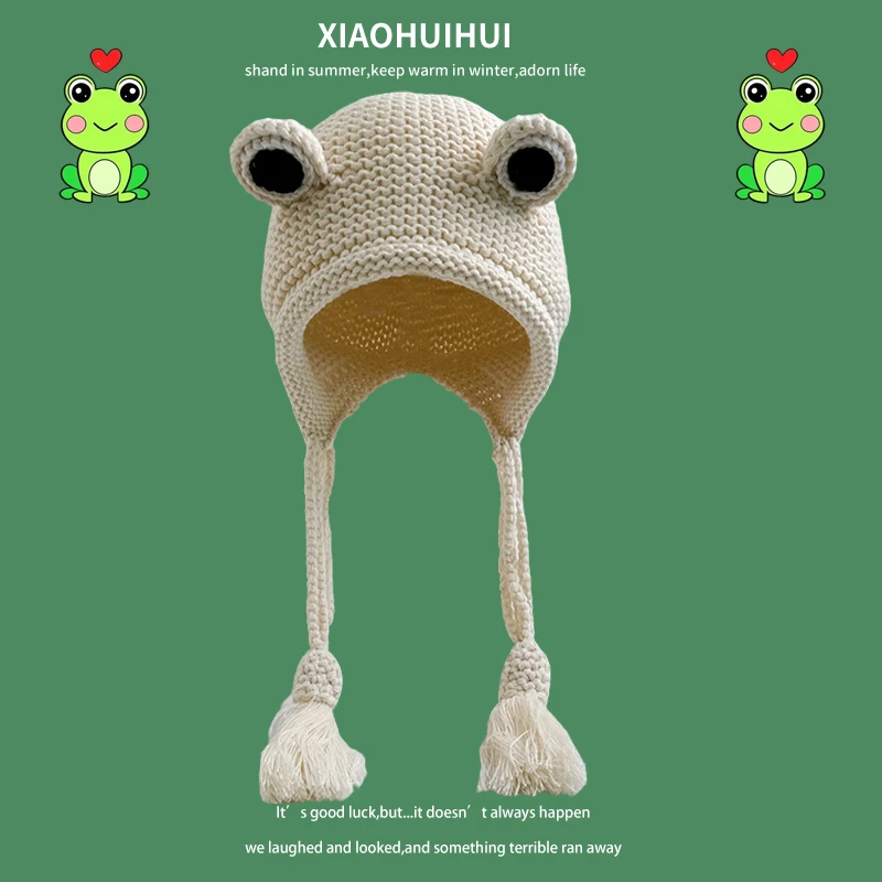 

New Cartoon Cute Frog Eyes Pullover Knitted Cap Men and Women Autumn and Winter Warm Tassel Funny Ear Protector Bomber Hats