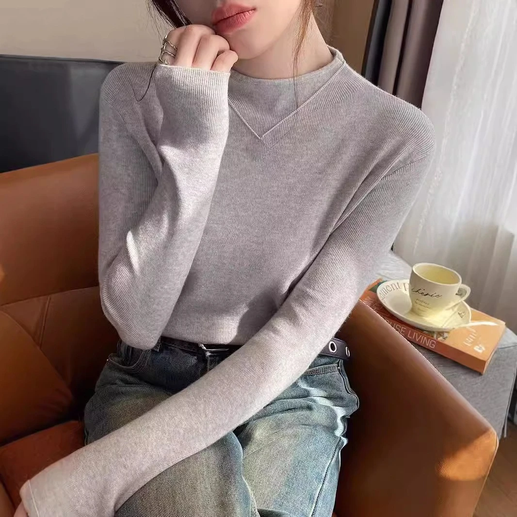 Nueva moda mujer Color sólido Simple básico suelto Casual moda medio cuello alto manga larga suéteres de punto camiseta interior femenina
