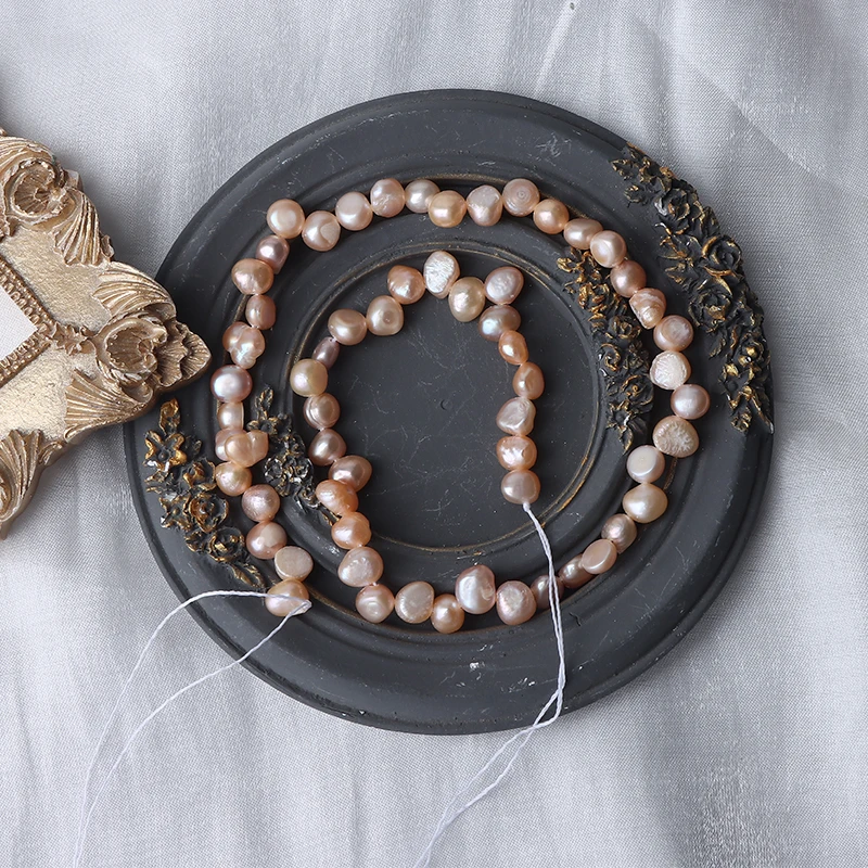 Natural colored 6-7mm Sanqi (Panax notoginseng) irregular two-sided polished, non-uniform Baroque pearls.